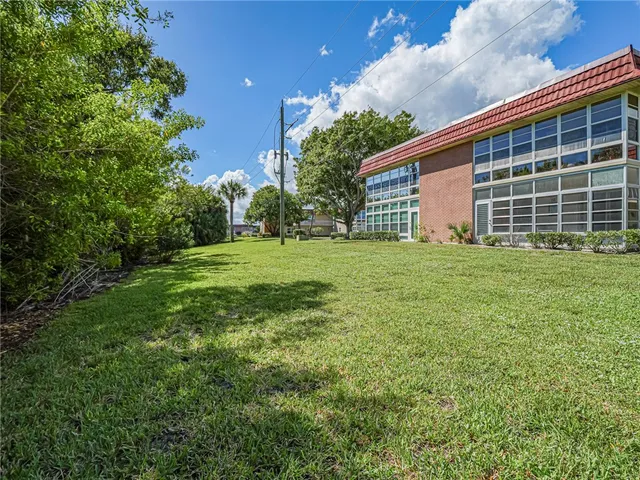 a view of a backyard with a garden