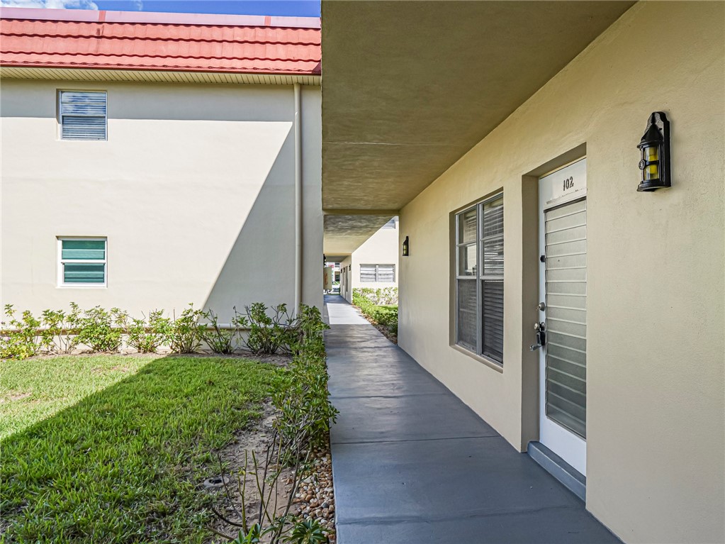 110 Spring Lake Court, Unit 102 Vero Beach, FL 32962 - Photo 3 of 33 a view of a back yard