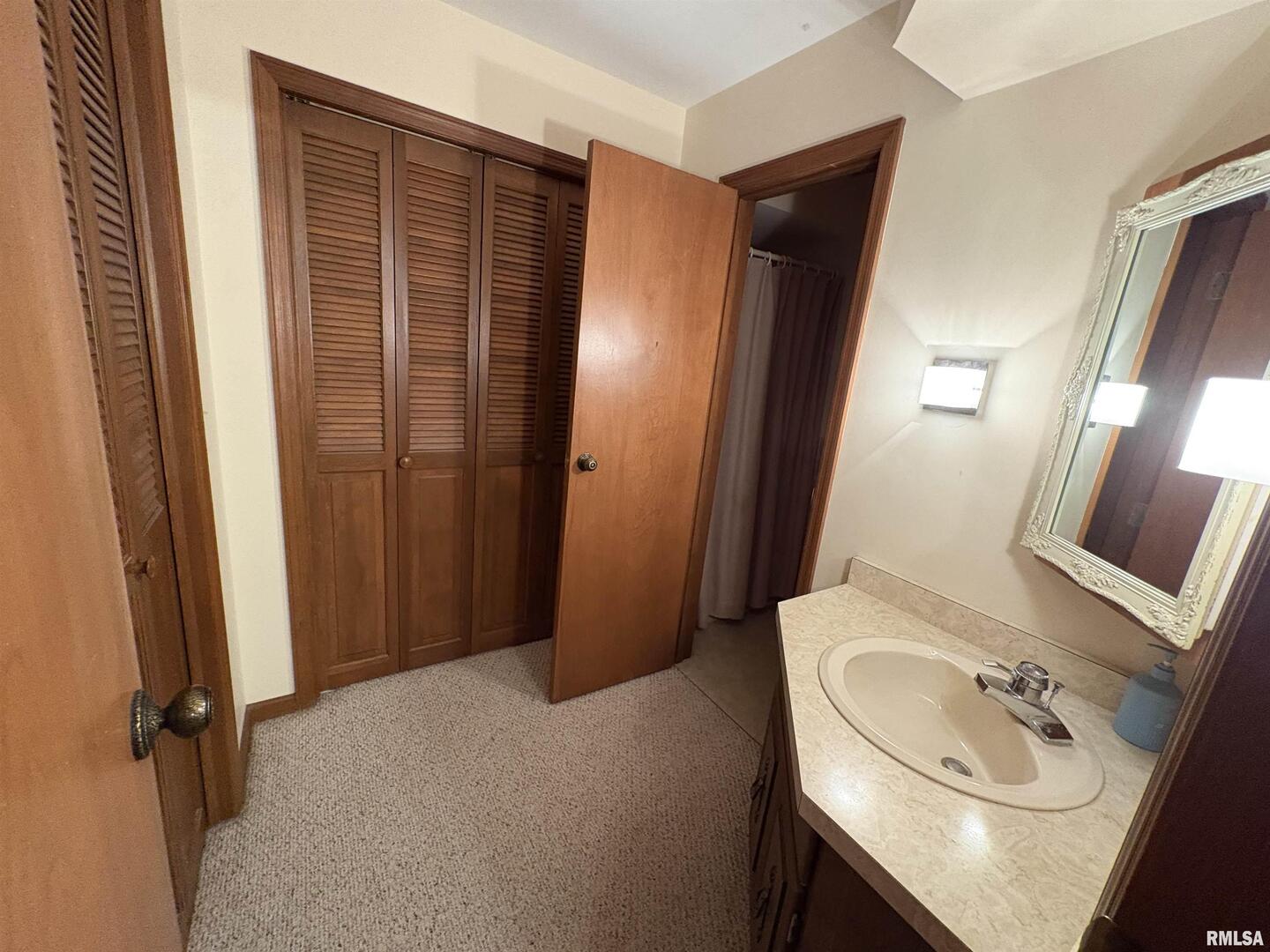 623 Meadowbrook Lane Centralia, IL 62801 - Photo 14 of 16 a bathroom with a sink a toilet and shower