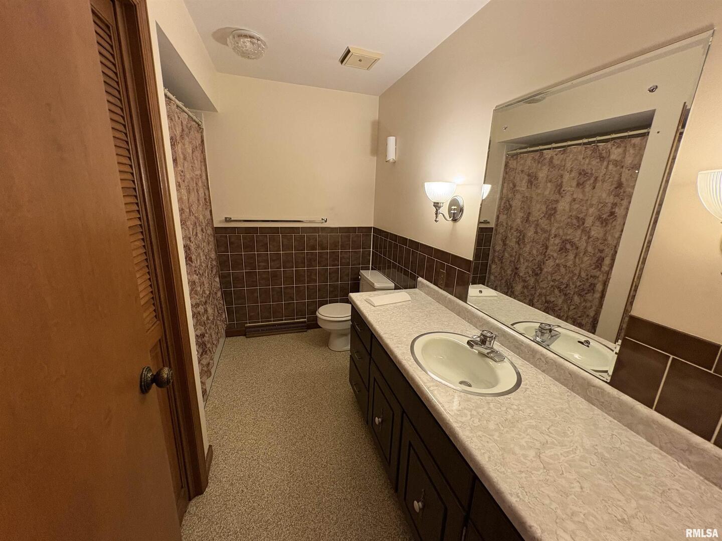 623 Meadowbrook Lane Centralia, IL 62801 - Photo 10 of 16 a bathroom with a granite countertop sink toilet and shower
