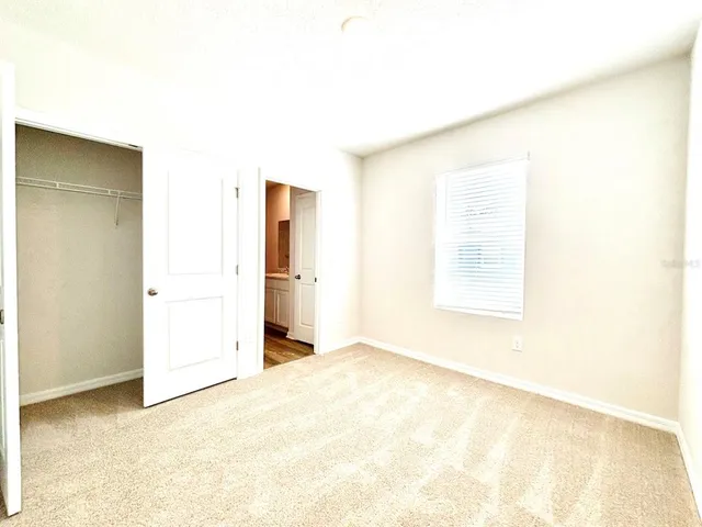 an empty room with a bathroom