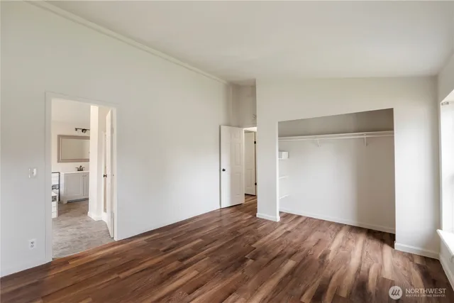 a view of a house with a backyard and a patio