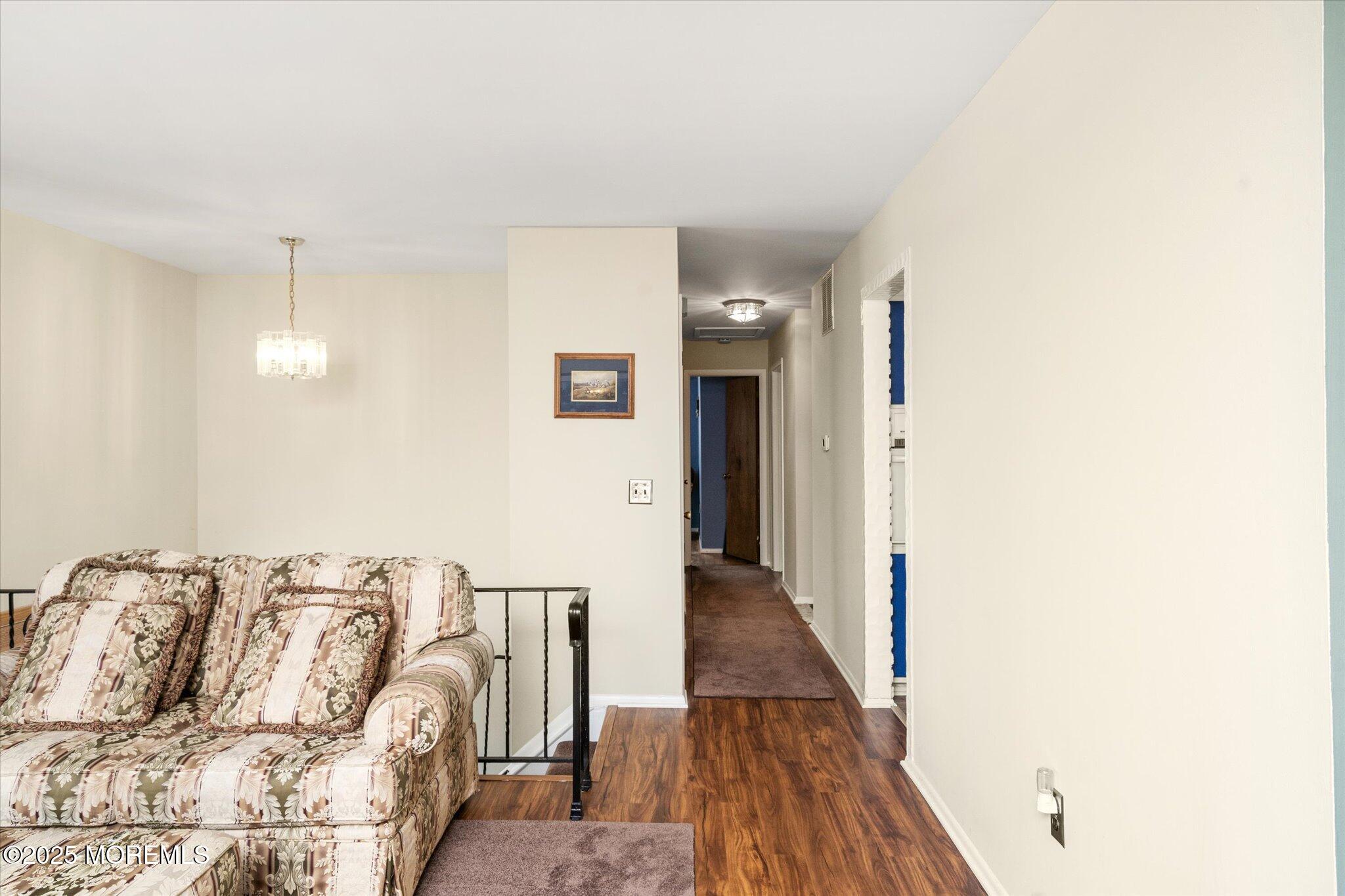 90 Valley Road Jackson, NJ 08527 - Photo 14 of 44 a living room with furniture and wooden floor