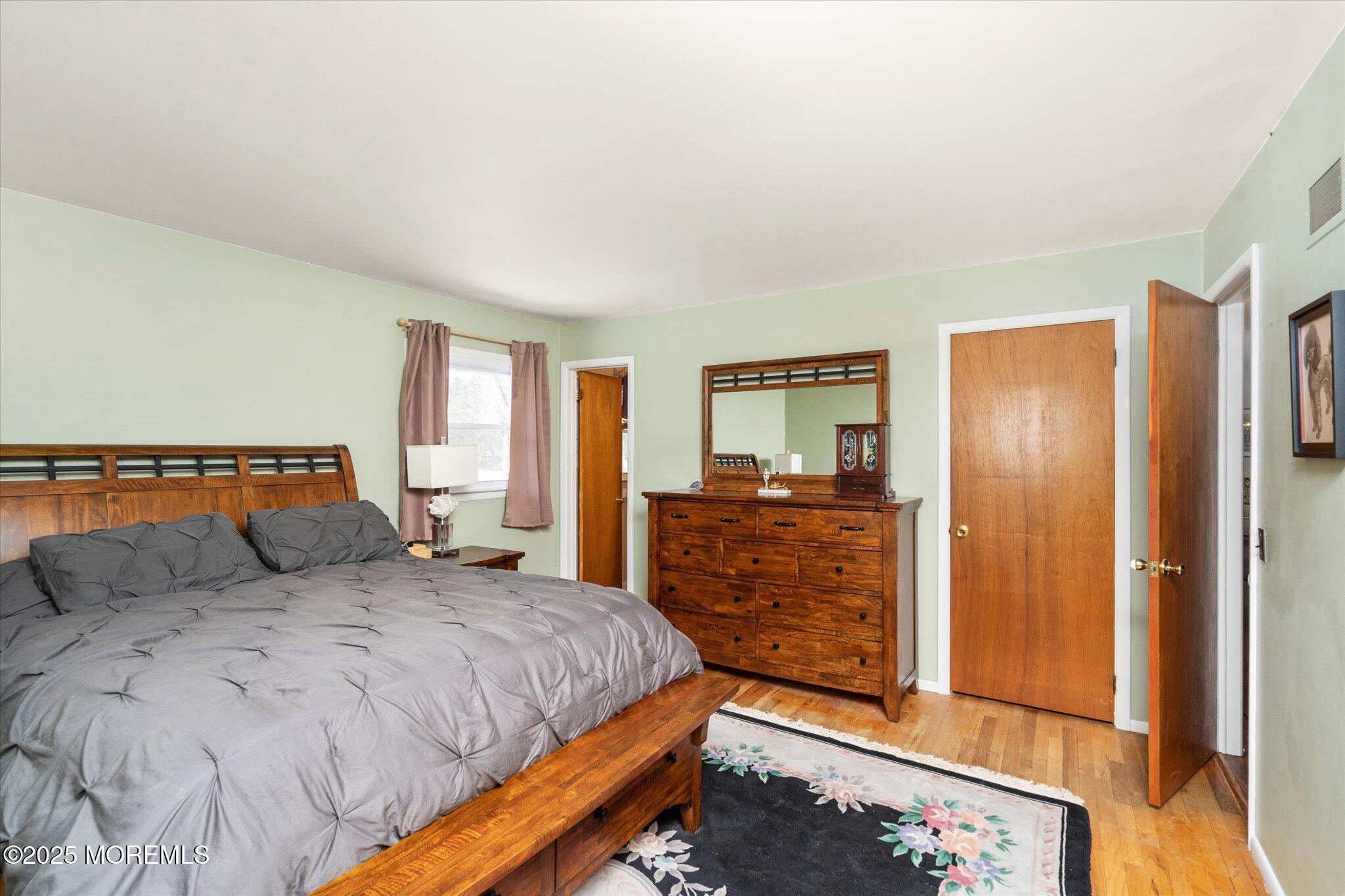 90 Valley Road Jackson, NJ 08527 - Photo 19 of 44 a bedroom with a bed and a dresser