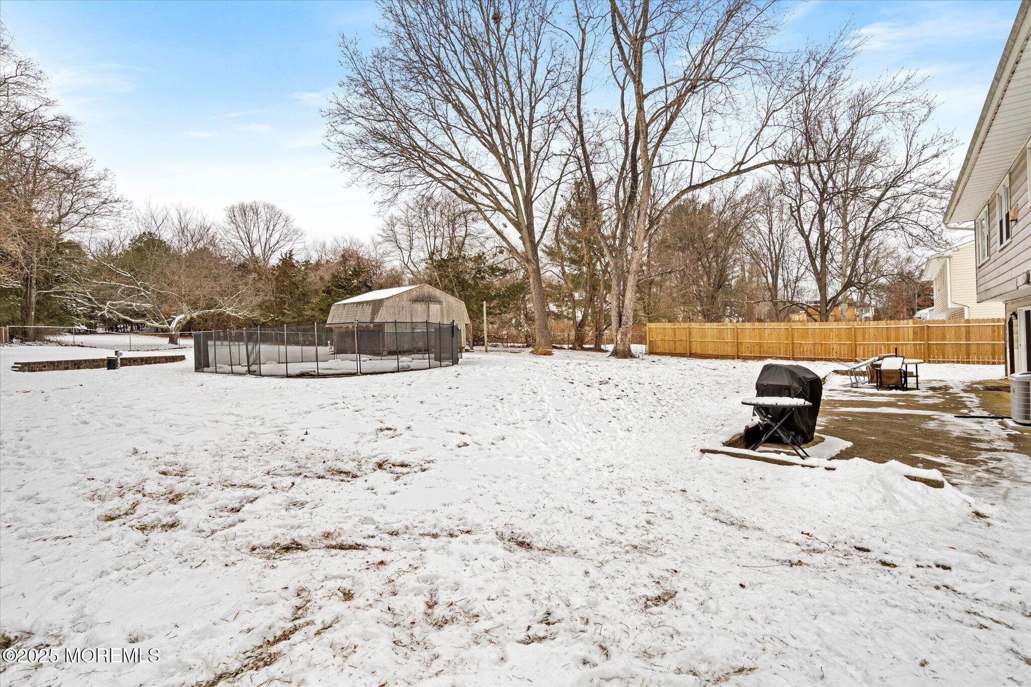 90 Valley Road Jackson, NJ 08527 - Photo 31 of 44 a view of a snow on the side of the road