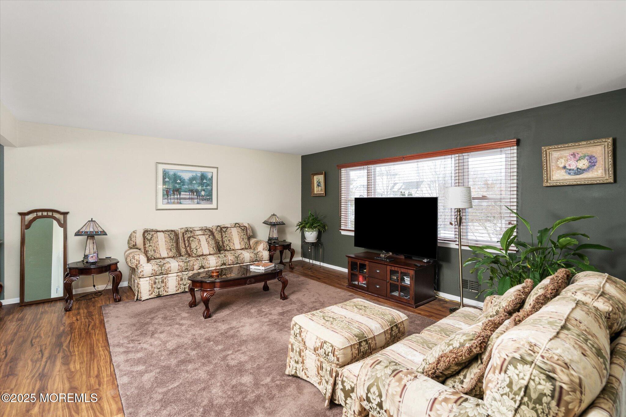90 Valley Road Jackson, NJ 08527 - Photo 4 of 44 a living room with furniture and a flat screen tv