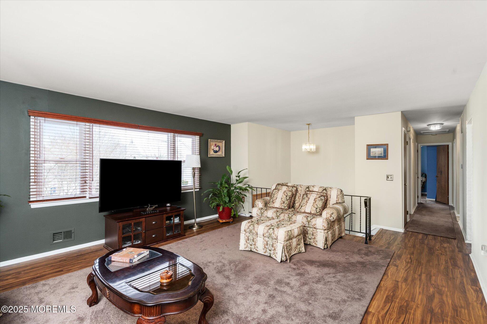 90 Valley Road Jackson, NJ 08527 - Photo 5 of 44 a living room with furniture and a flat screen tv