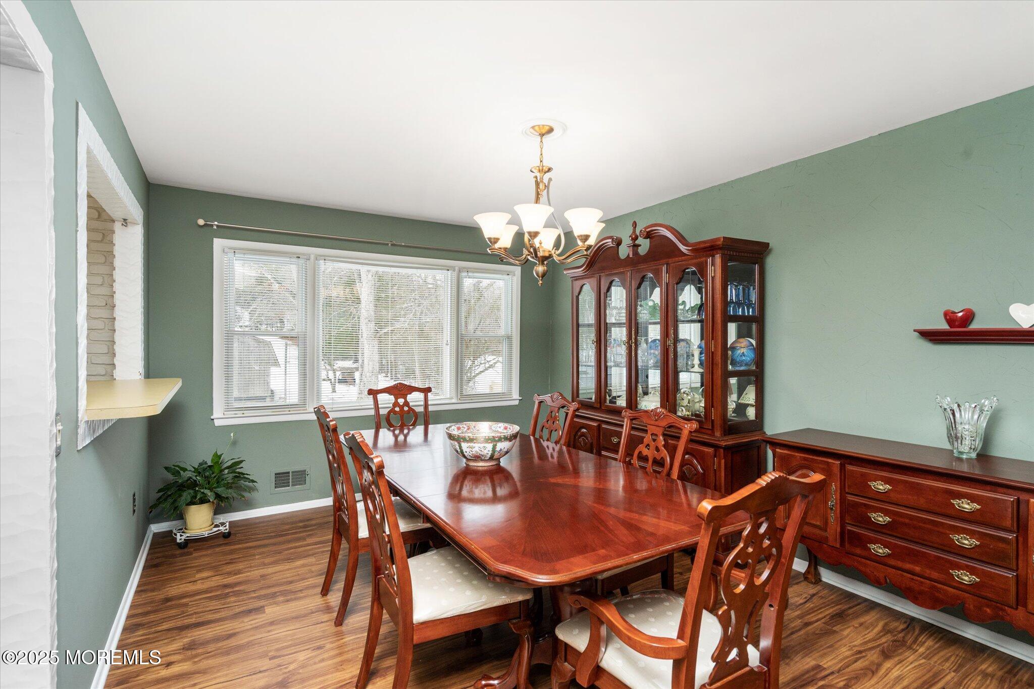 90 Valley Road Jackson, NJ 08527 - Photo 8 of 44 a view of a dining room with furniture window and wooden floor