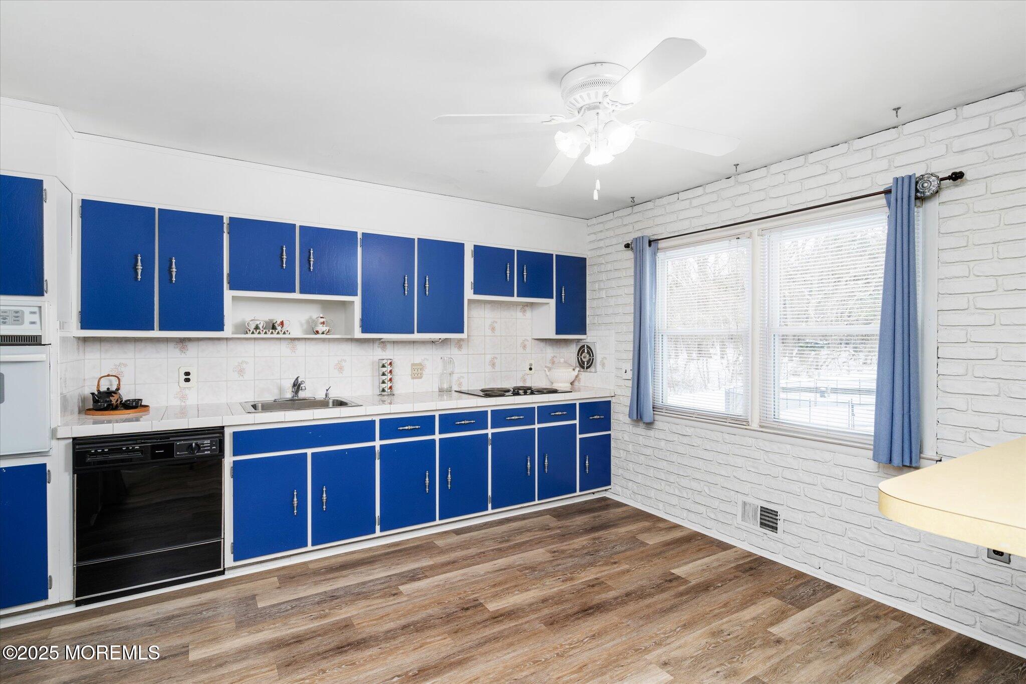 90 Valley Road Jackson, NJ 08527 - Photo 10 of 44 a kitchen with stainless steel appliances granite countertop a stove a sink dishwasher and a microwave oven