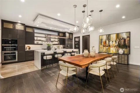 a kitchen with a table and chairs in it