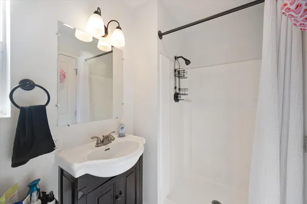 a view of a livingroom with furniture and toys