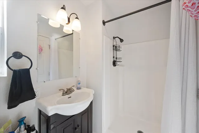 a view of a livingroom with furniture and toys