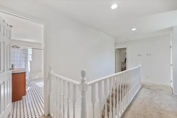 a kitchen that has a lot of cabinets in it