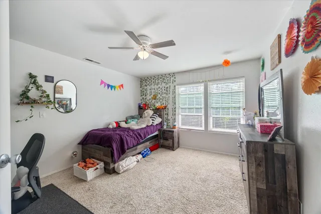 a view of yard with large trees