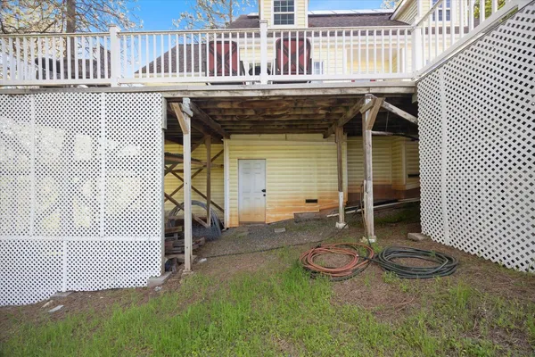a view of swimming pool in he middle of the green field