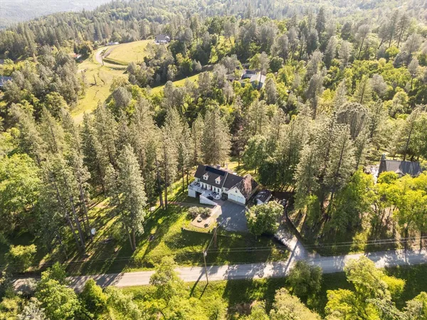 a view of entryway and hall with a living room