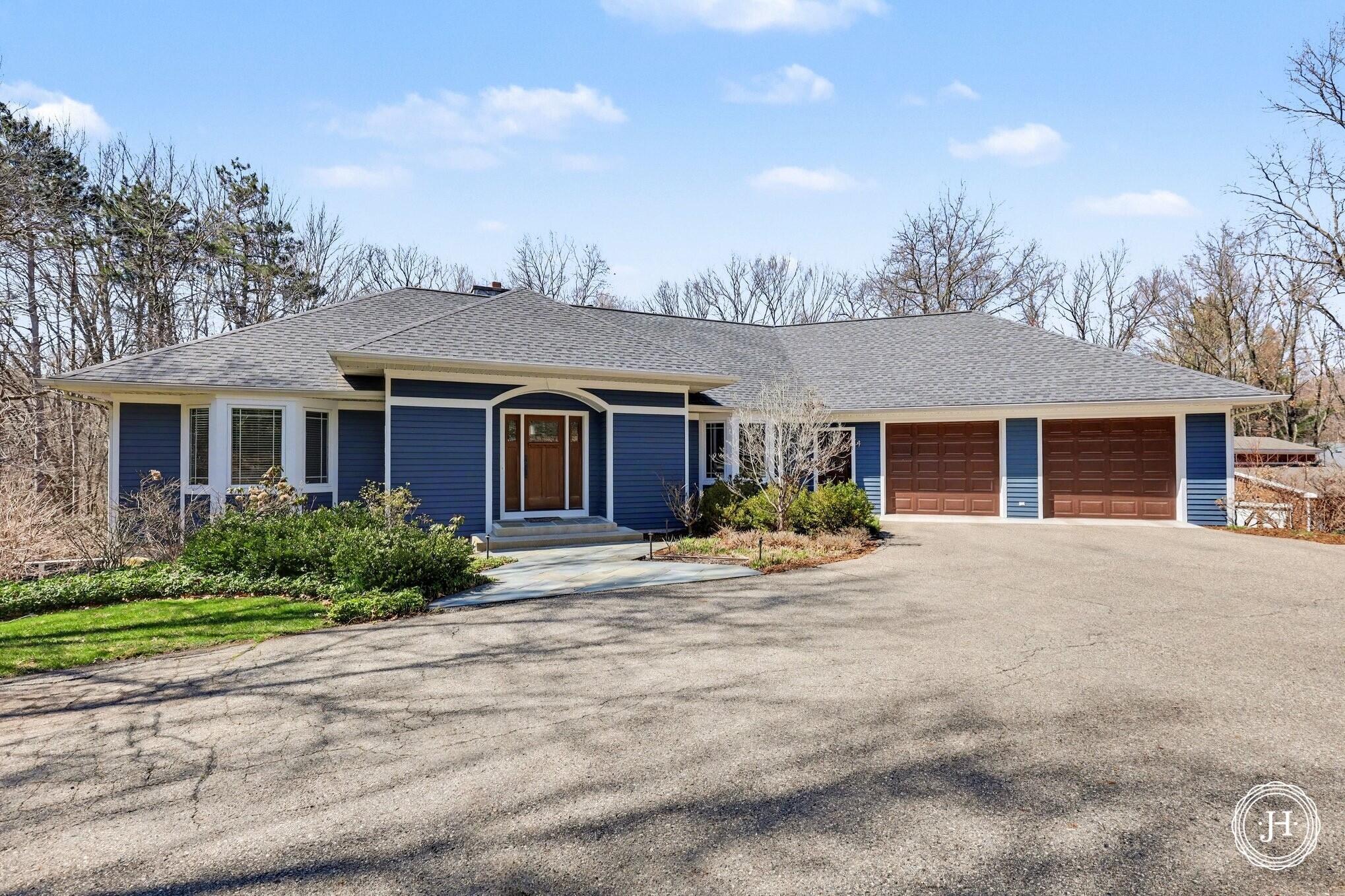 8655 Conservation Street Northeast Ada, MI 49301 - Photo 1 of 50 6a507672-879d-4ee0-8878-31e903673258