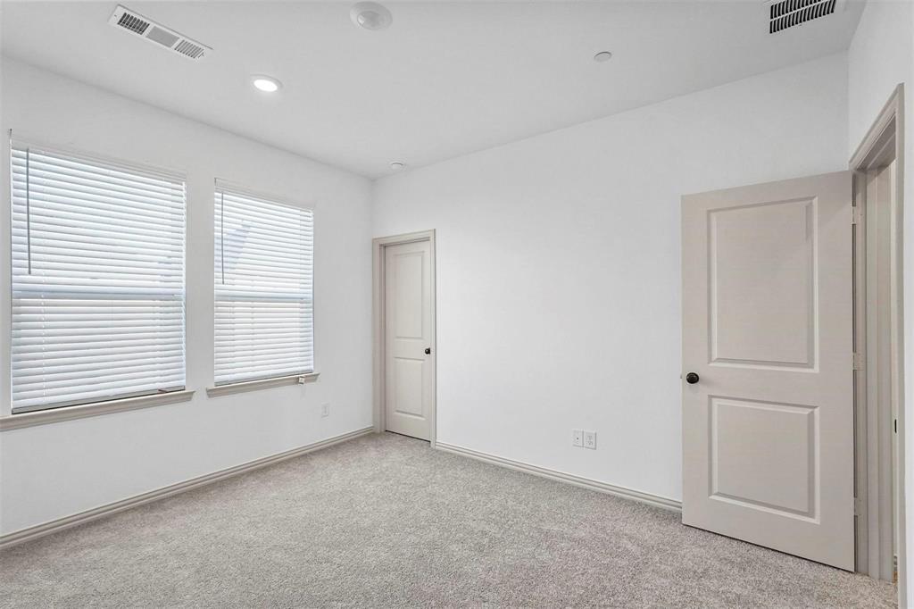2640 Bluejack Road McKinney, TX 75071 - Photo 16 of 18 a view of an empty room with a window