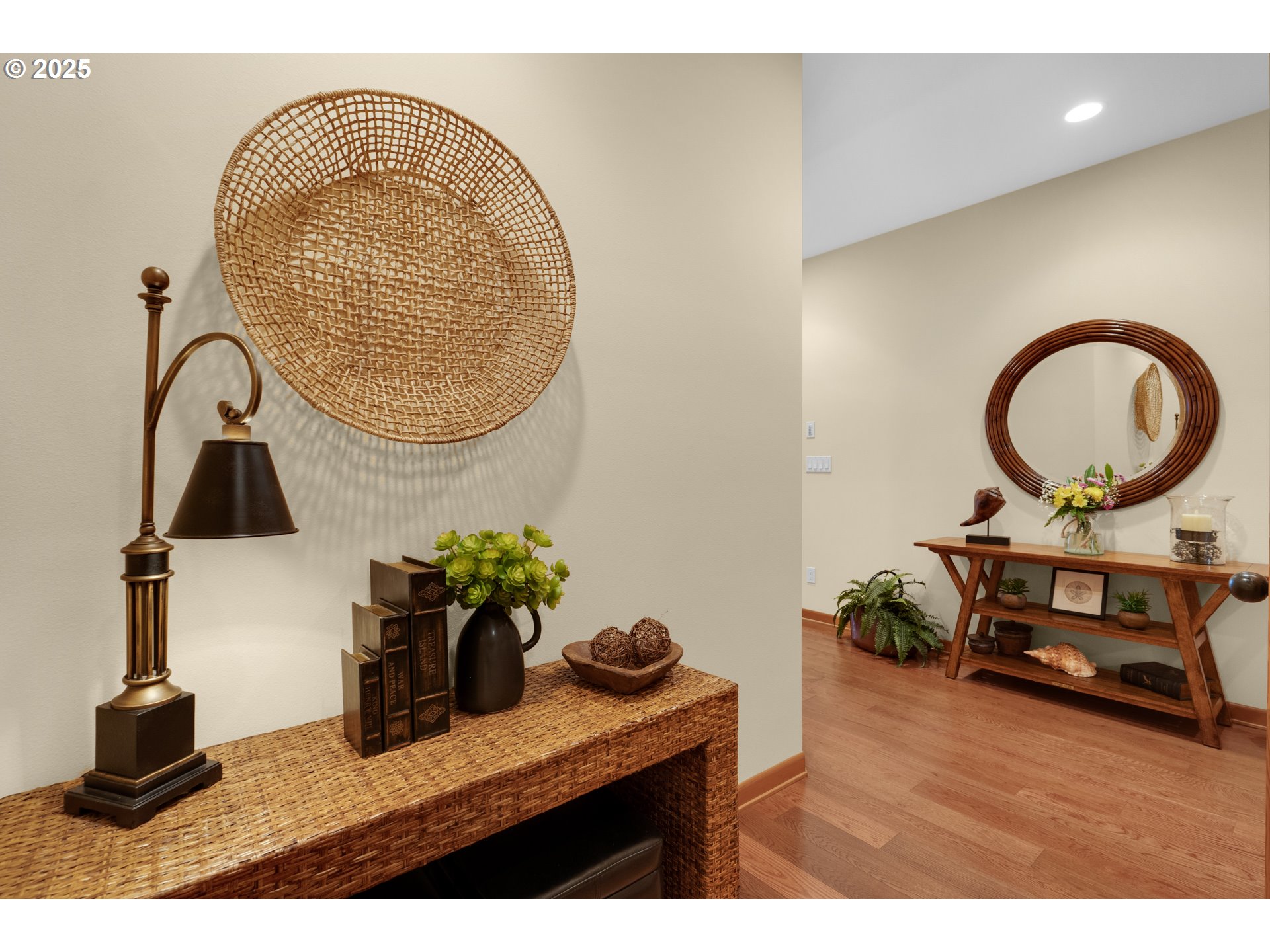 123 South Hemlock Street, Unit 201 Cannon Beach, OR 97110 - Photo 11 of 48 a living room with furniture and a mirror