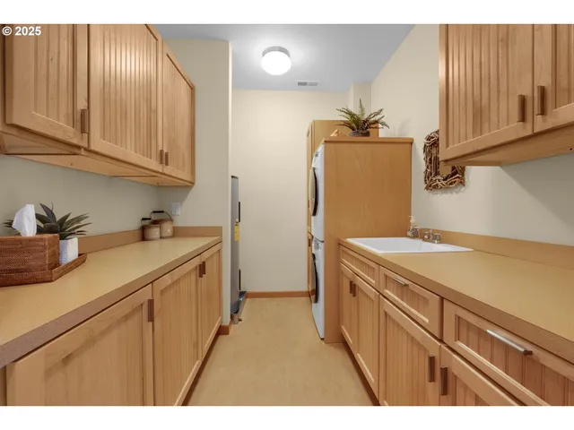 a bedroom with a bed and with furniture