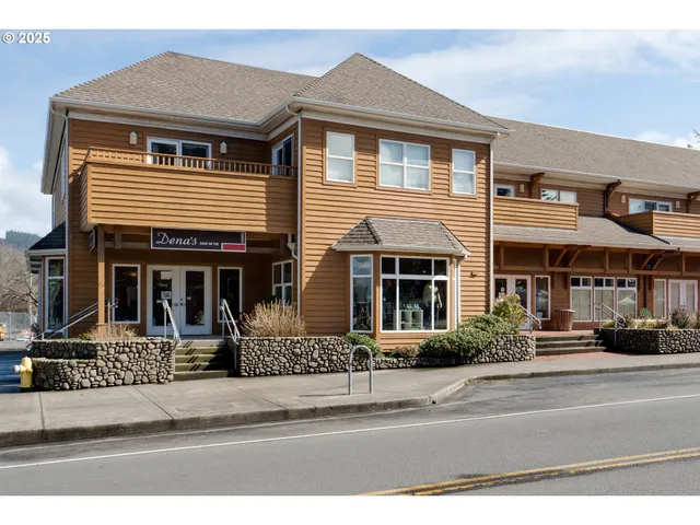 a view of a car park in front of house