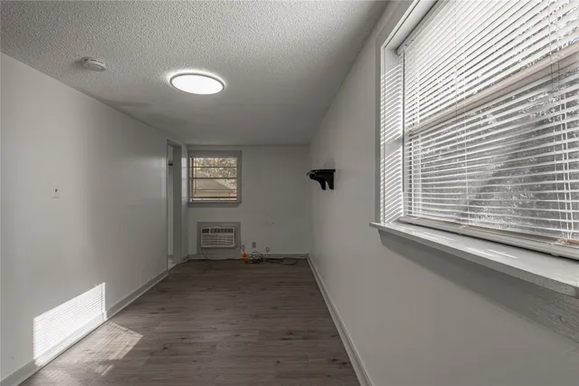 a view of empty room with windows