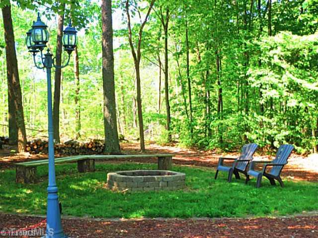 700 Shellhabour Boulevard Rural Hall, NC 27045 - Photo 15 of 16 Yard/Garden. Relax and be social at your own fire pit area
