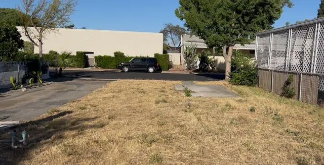 a view of a street with cars