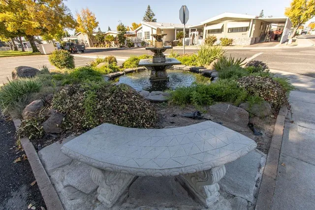 a view of a yard in front of the house