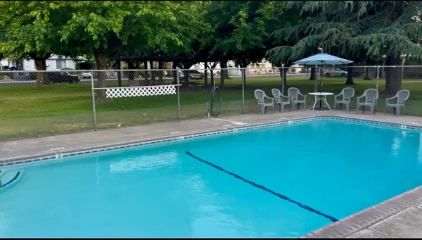 a garden view with a seating space