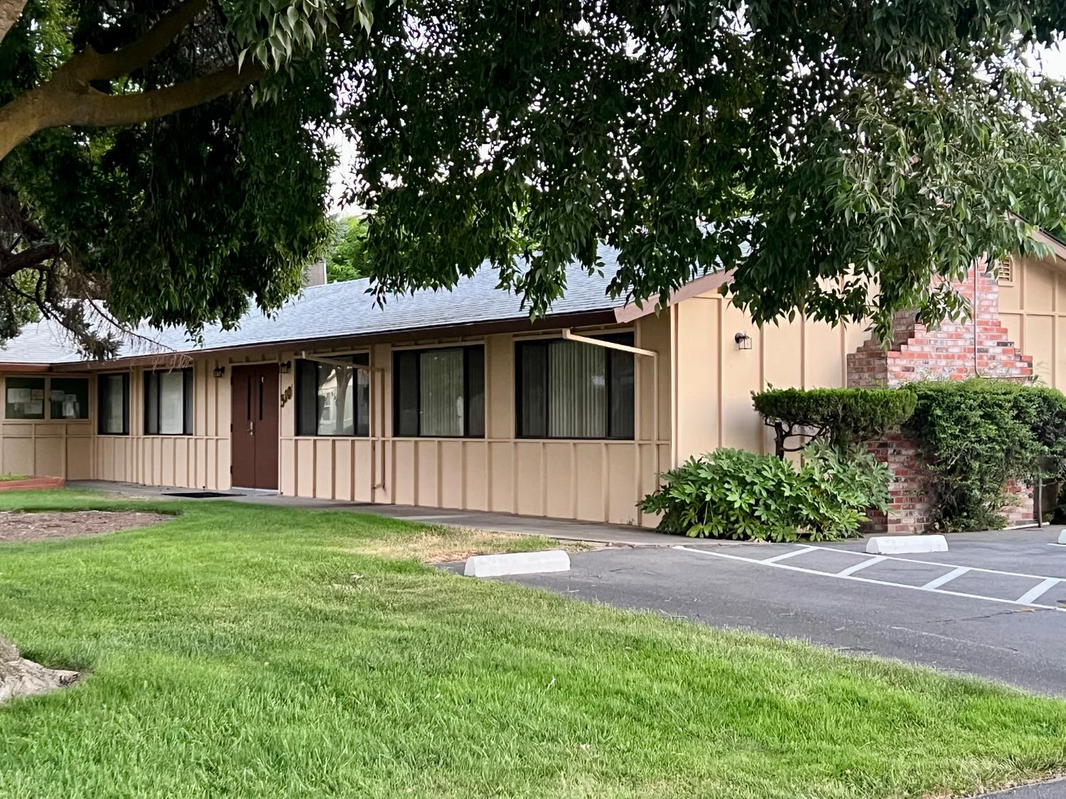3037 Holiday Lane Modesto, CA 95350 - Photo 9 of 18 a view of a house with a yard