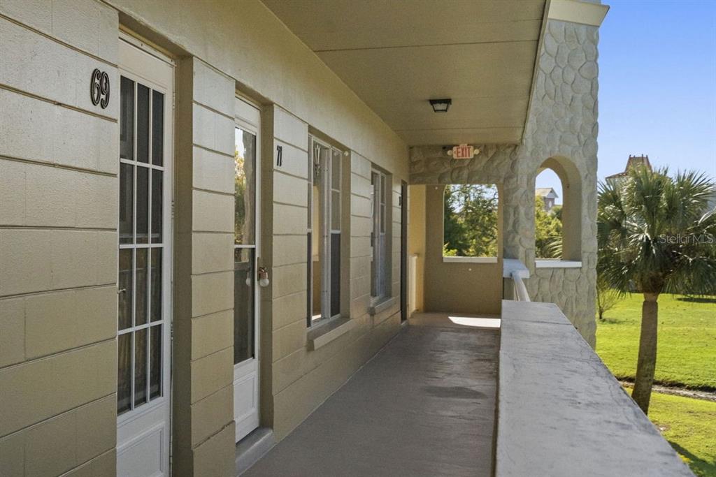 2391 Sumatran Way, Unit 69 Clearwater, FL 33763 - Photo 23 of 50 a view of a house with a porch