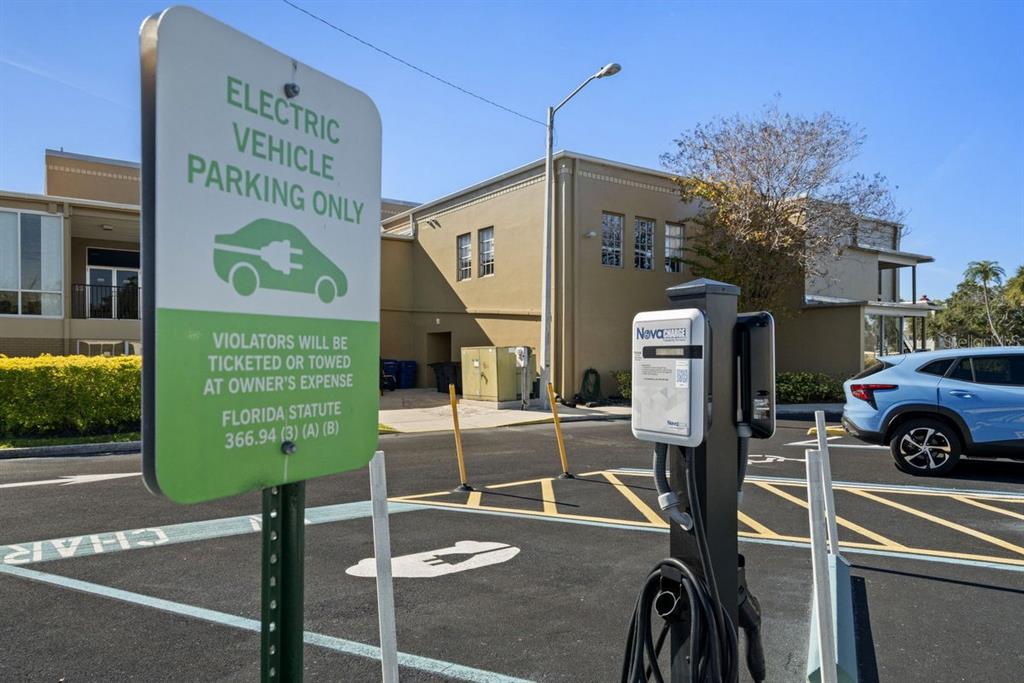 2391 Sumatran Way, Unit 69 Clearwater, FL 33763 - Photo 45 of 50 a view of a car park in front of building