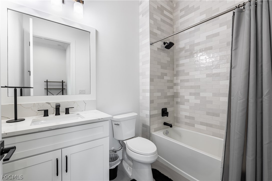 3337 Chestnut Grove Drive Alva, FL 33920 - Photo 12 of 50 a bathroom with a sink toilet and shower