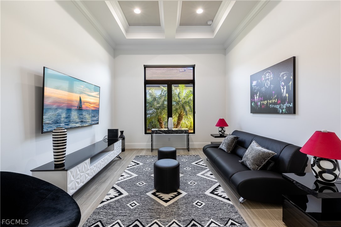 3337 Chestnut Grove Drive Alva, FL 33920 - Photo 14 of 50 a living room with furniture and a flat screen tv