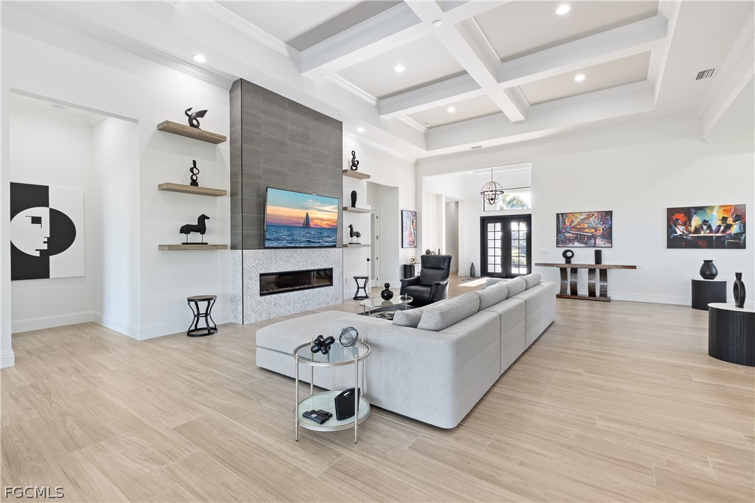 3337 Chestnut Grove Drive Alva, FL 33920 - Photo 19 of 50 a living room with furniture and a flat screen tv