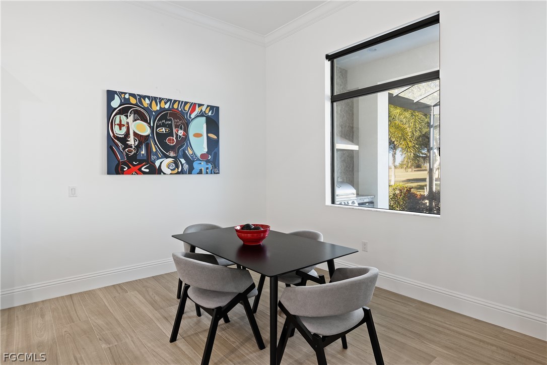 3337 Chestnut Grove Drive Alva, FL 33920 - Photo 27 of 50 a view of a workspace with furniture and wooden floor