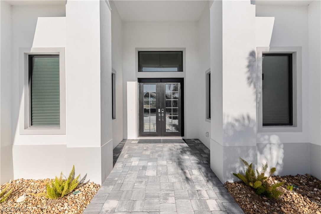 3337 Chestnut Grove Drive Alva, FL 33920 - Photo 3 of 50 a front view of a house with a yard