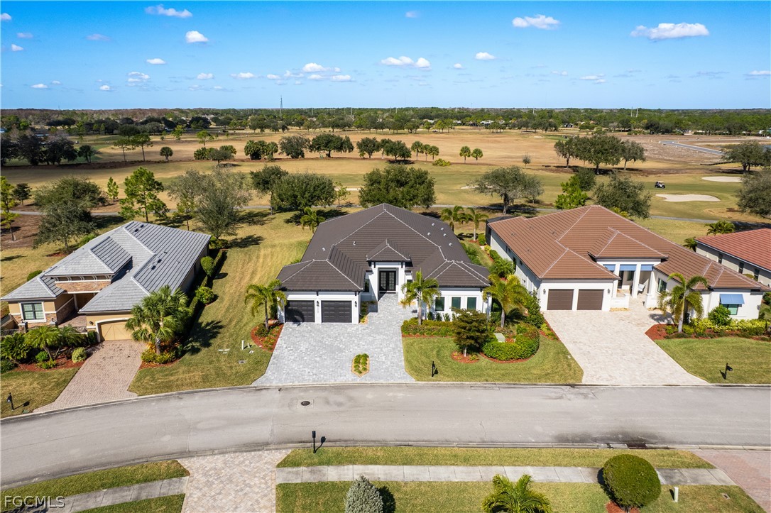 3337 Chestnut Grove Drive Alva, FL 33920 - Photo 45 of 50 an aerial view of residential houses with outdoor space and ocean view