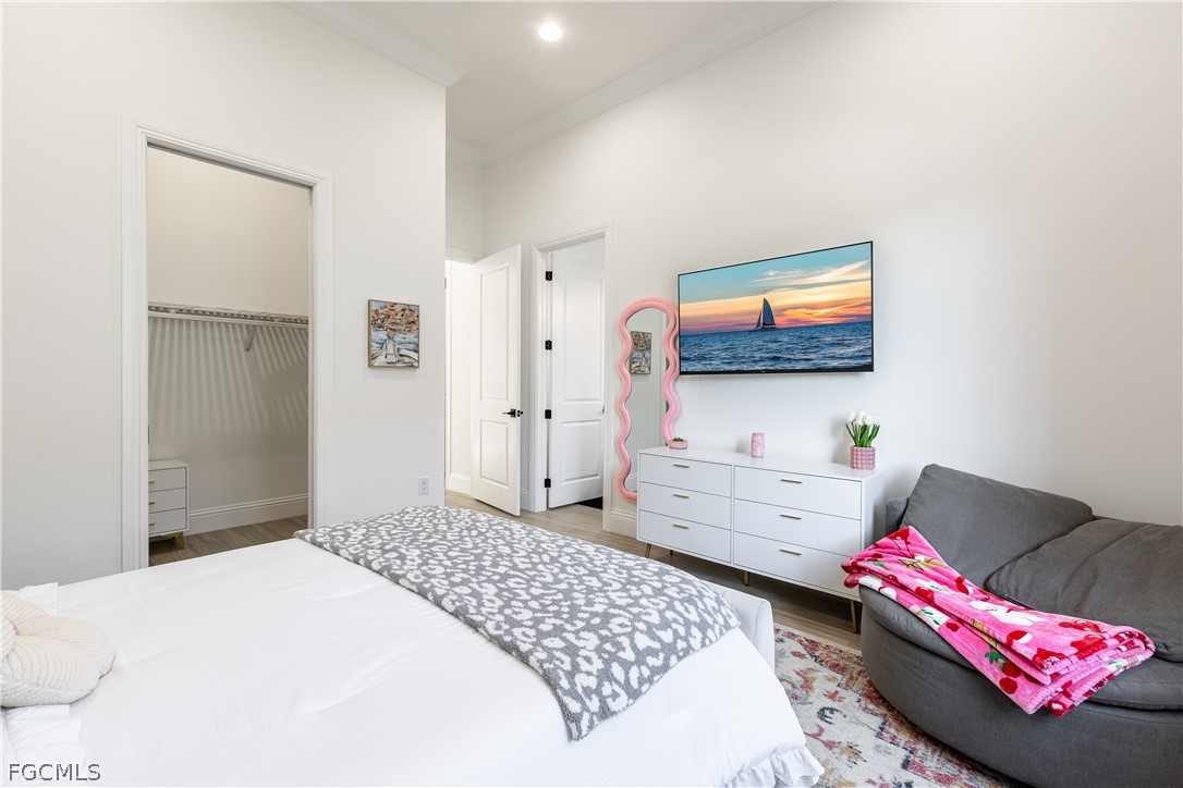 3337 Chestnut Grove Drive Alva, FL 33920 - Photo 8 of 50 a bedroom with furniture and flat screen tv