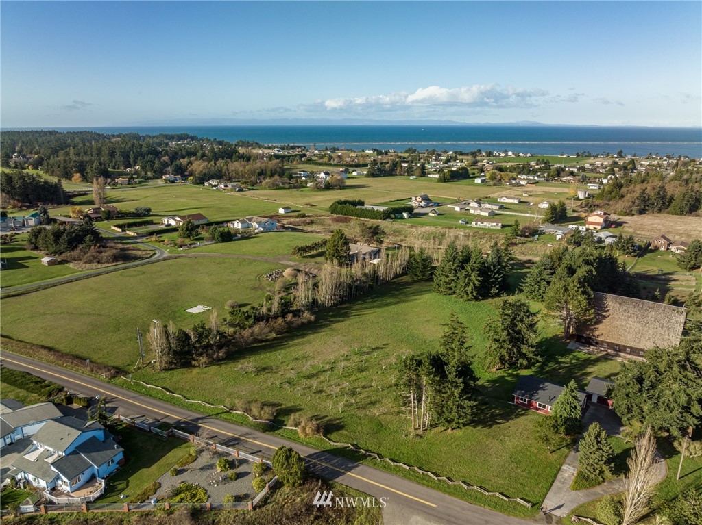 999 Lotzgesell Road Sequim, WA 98382 - Photo 4 of 29 an aerial view of a city