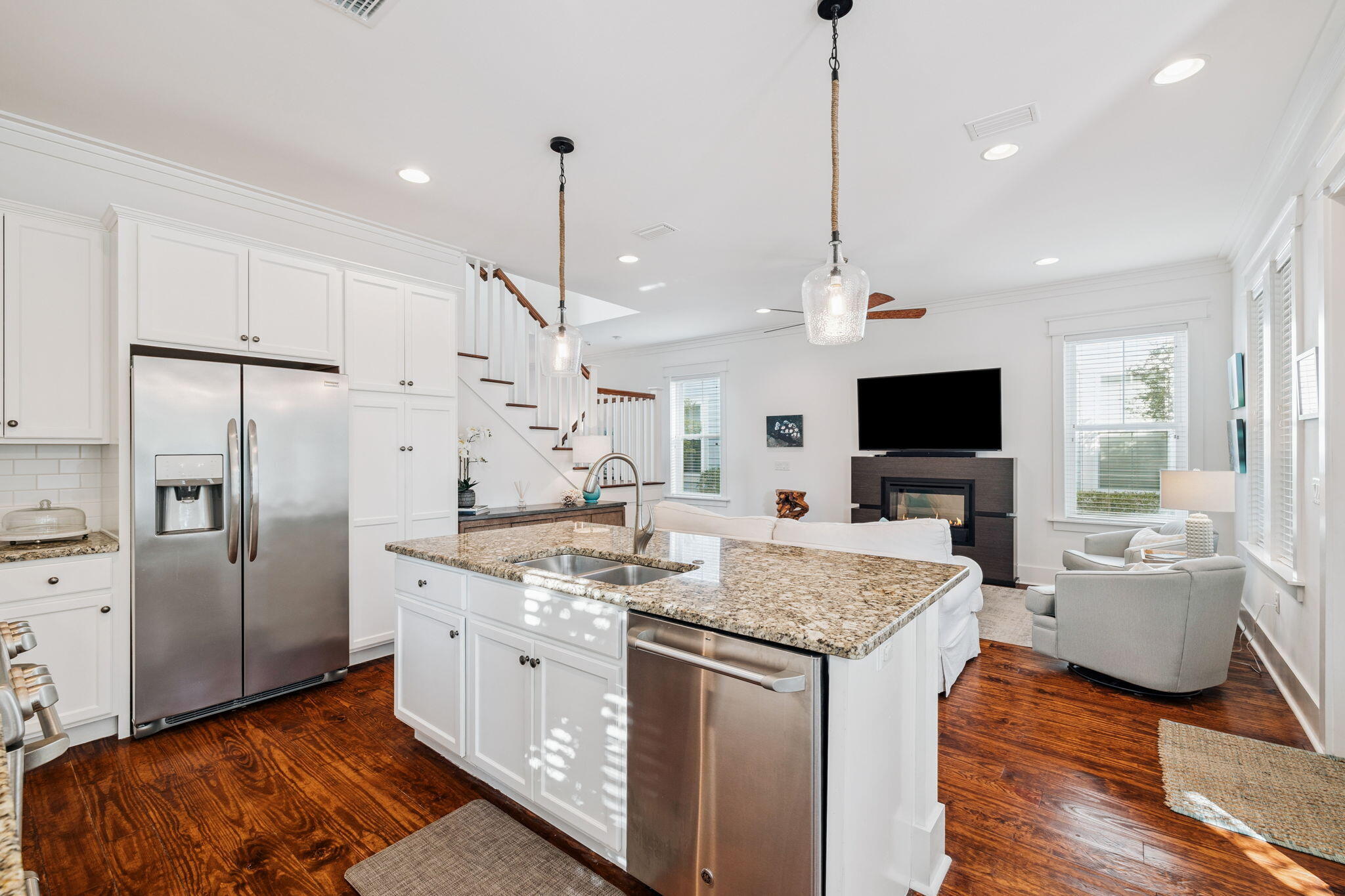 844 Sandgrass Boulevard Santa Rosa Beach, FL 32459 - Photo 19 of 74 a kitchen with stainless steel appliances granite countertop a stove and refrigerator