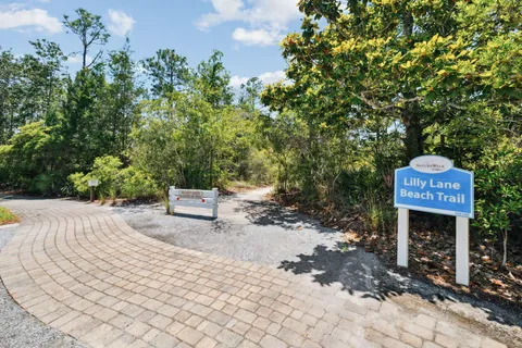 an aerial view of a house with outdoor space