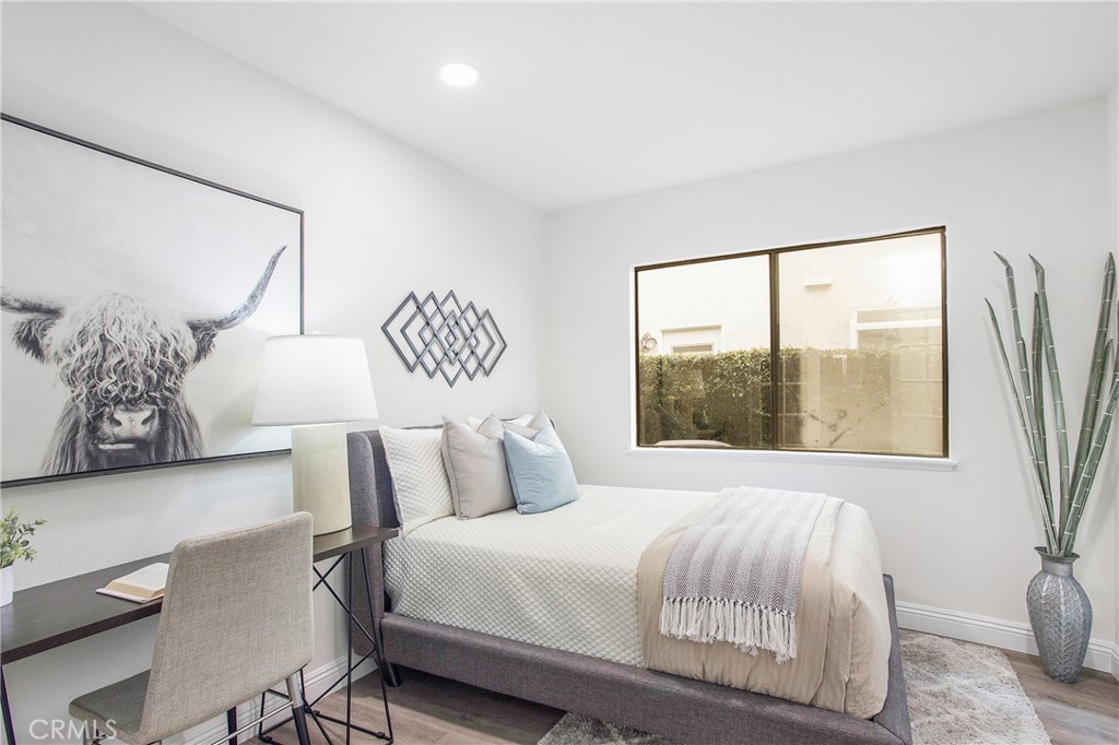 11 Ensueno West Irvine, CA 92620 - Photo 17 of 36 a bedroom with a large bed and a window