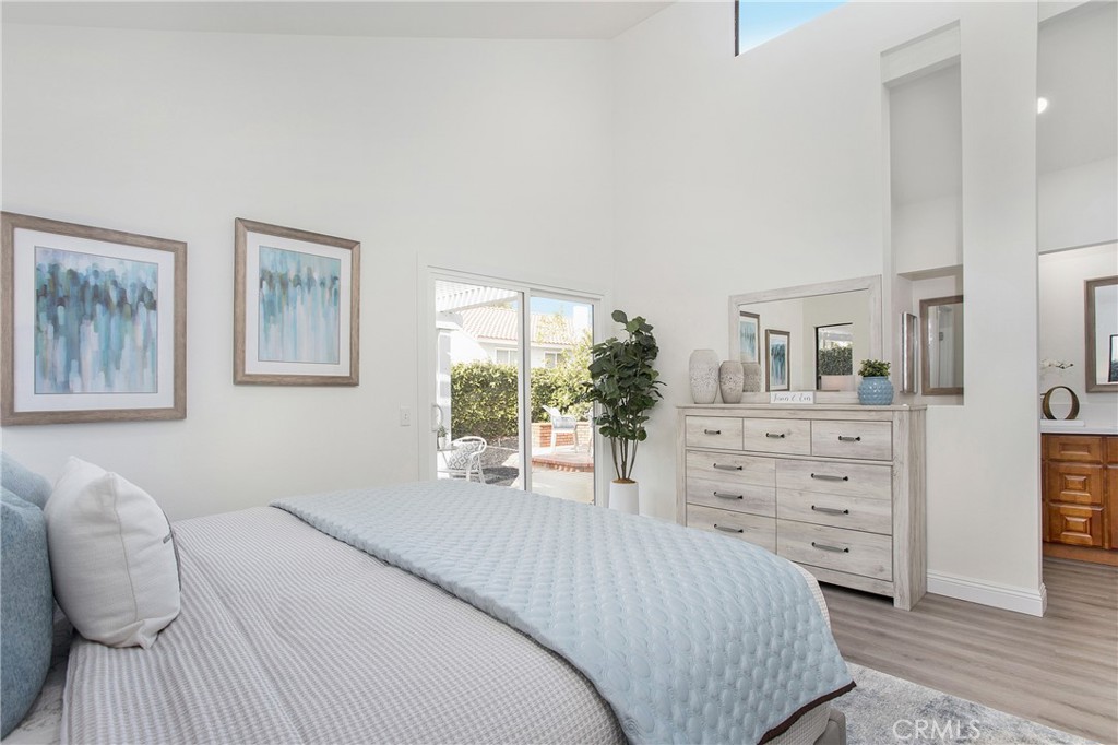 11 Ensueno West Irvine, CA 92620 - Photo 22 of 36 a bedroom with a bed and a dresser