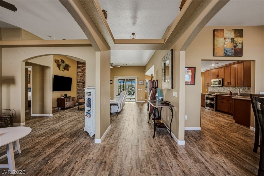 4892 Quail Run Road Pahrump, NV 89060 - Photo 18 of 90 An inviting kitchen with granite counters and a charming dining area with scenic views.