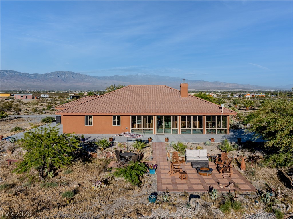 4892 Quail Run Road Pahrump, NV 89060 - Photo 57 of 90 This spacious property offers an expansive outdoor living area perfect for entertaining.