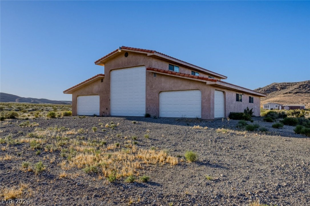 4892 Quail Run Road Pahrump, NV 89060 - Photo 58 of 90 RV garage w/ 2 bedrooms, kitchen/family room combo