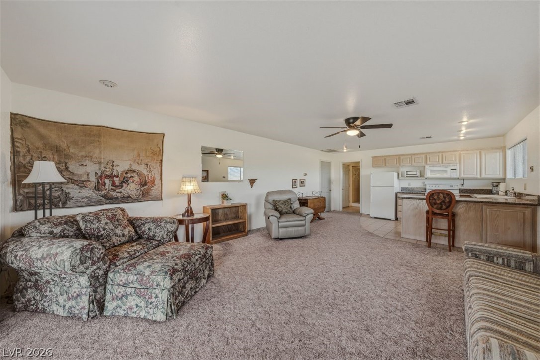 4892 Quail Run Road Pahrump, NV 89060 - Photo 61 of 90 RV garage family room