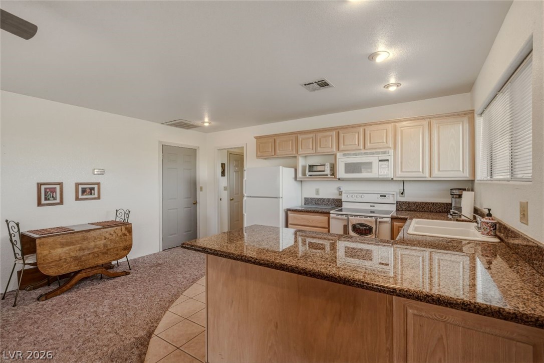 4892 Quail Run Road Pahrump, NV 89060 - Photo 65 of 90 RV garage family room